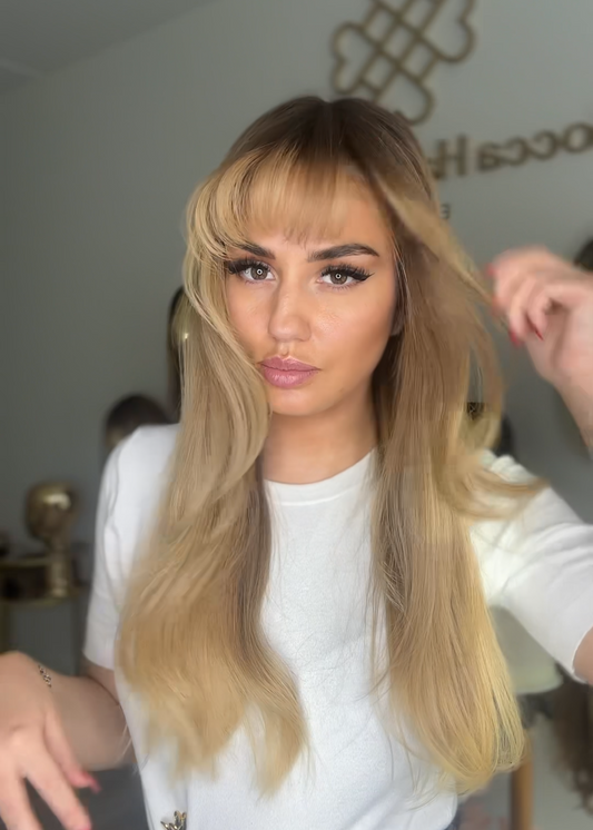 Warm blonde wig with brown roots and bangs